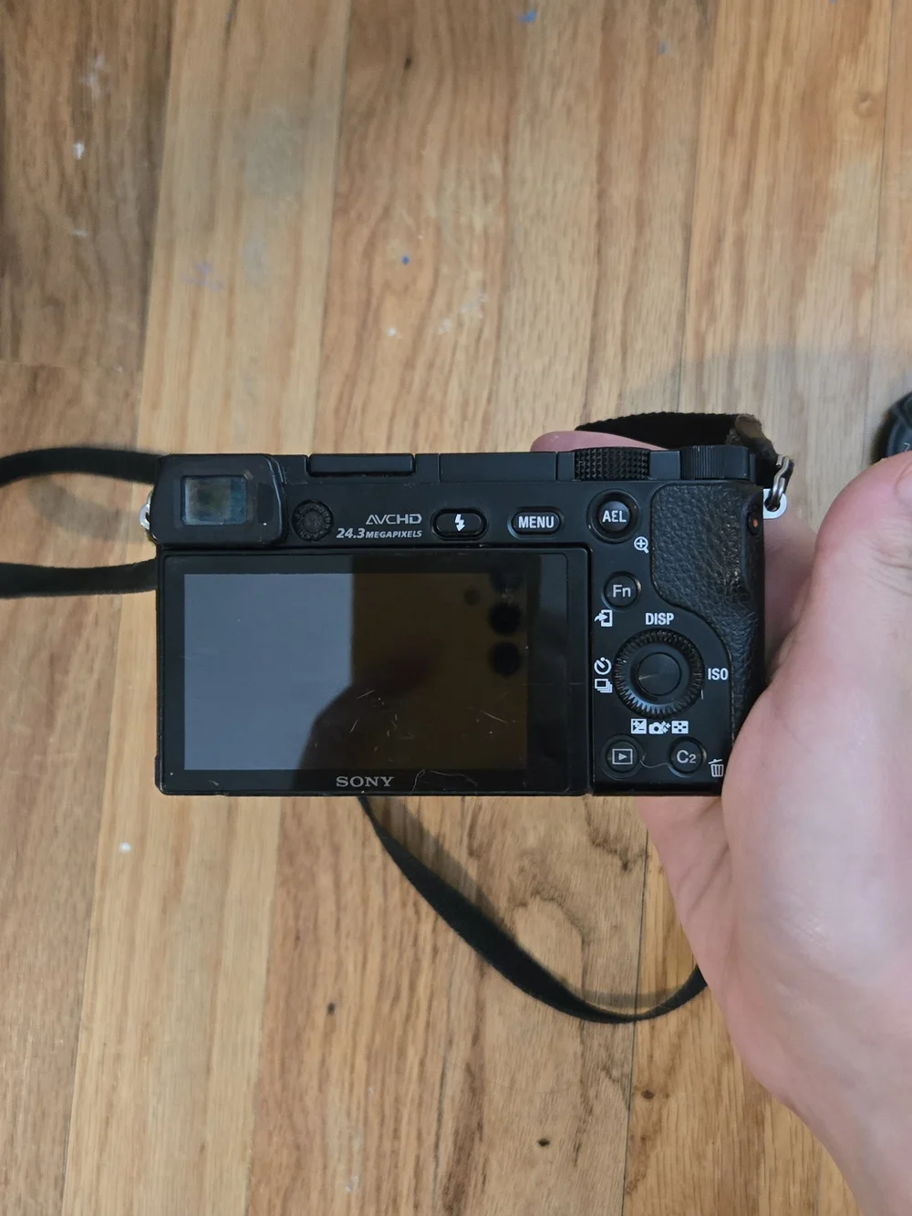 Sony Black Compact Mirrorless Camera with Black Case and Charger